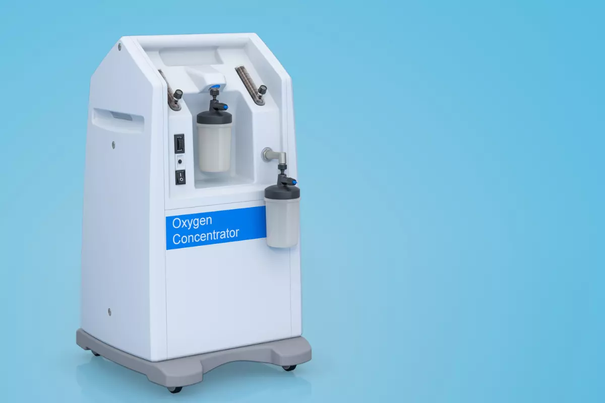 a portable oxygen concentrator on a blue background